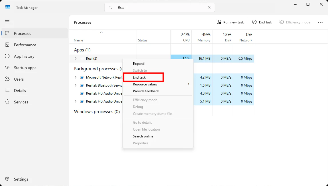 Task Manager with Real selected and End task highlighted.